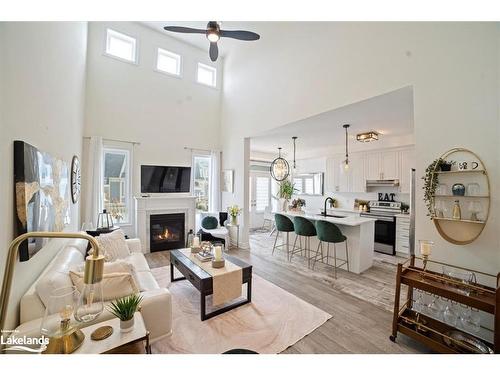 5 Nautical Lane, Wasaga Beach, ON - Indoor Photo Showing Living Room With Fireplace