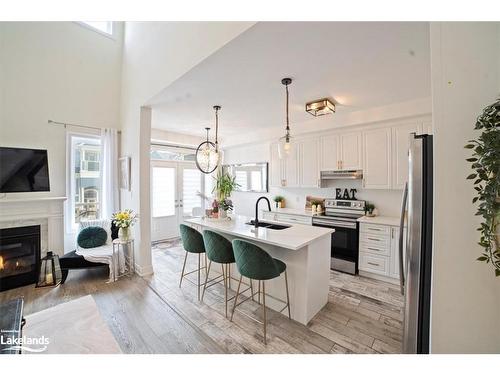 5 Nautical Lane, Wasaga Beach, ON - Indoor Photo Showing Kitchen With Fireplace With Upgraded Kitchen