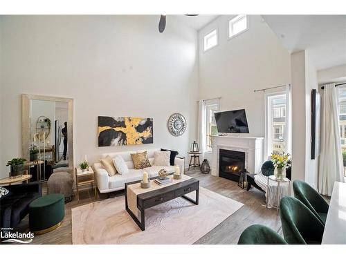 5 Nautical Lane, Wasaga Beach, ON - Indoor Photo Showing Living Room With Fireplace