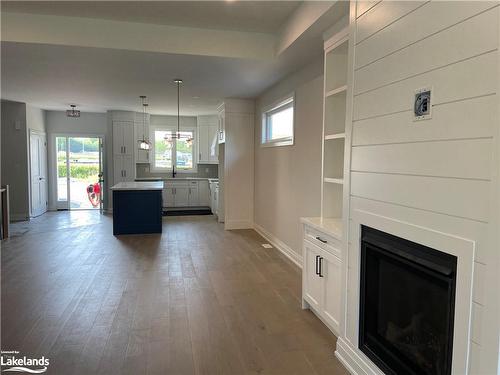 136 Brandon Avenue, Coldwater, ON - Indoor Photo Showing Living Room With Fireplace