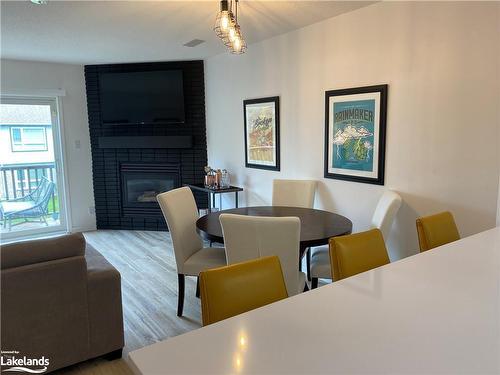 710 Johnston Park Avenue, Collingwood, ON - Indoor Photo Showing Dining Room With Fireplace