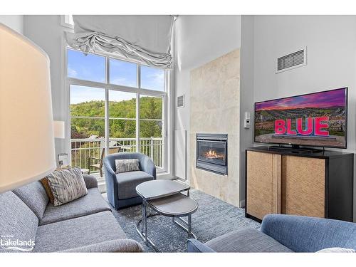 449-220 Gord Canning Drive, The Blue Mountains, ON - Indoor Photo Showing Living Room With Fireplace