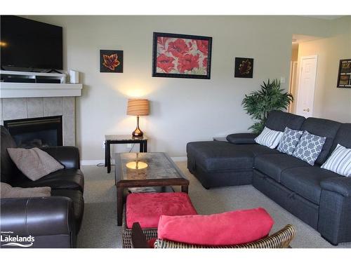 660 Johnston Park Avenue, Collingwood, ON - Indoor Photo Showing Living Room With Fireplace