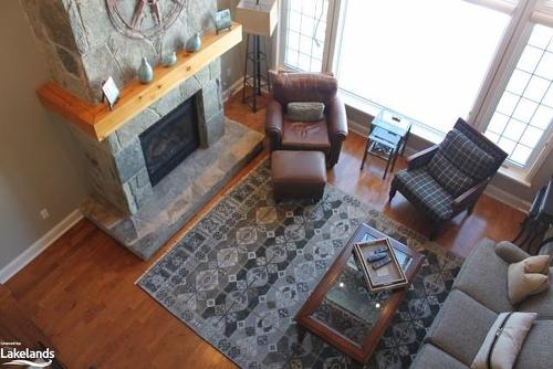 Carling 4 Week 9-3876 Muskoka Road 118 W, Port Carling, ON - Indoor With Fireplace