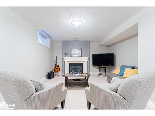 13-5 Invermara Court, Orillia, ON - Indoor Photo Showing Living Room With Fireplace