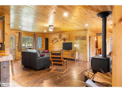 1099 Bunny Trail, Whitestone, ON - Indoor Photo Showing Living Room