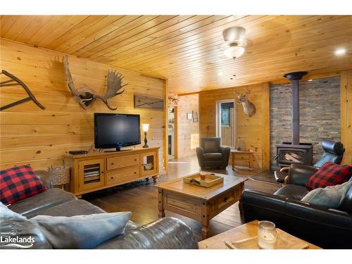 1099 Bunny Trail, Whitestone, ON - Indoor Photo Showing Living Room