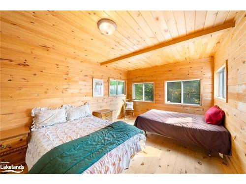 1099 Bunny Trail, Whitestone, ON - Indoor Photo Showing Bedroom