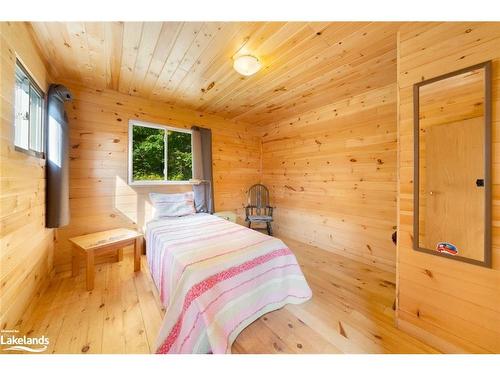 1099 Bunny Trail, Whitestone, ON - Indoor Photo Showing Bedroom