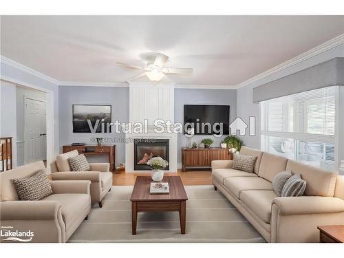 7 Trailwood Place, Wasaga Beach, ON - Indoor Photo Showing Living Room With Fireplace