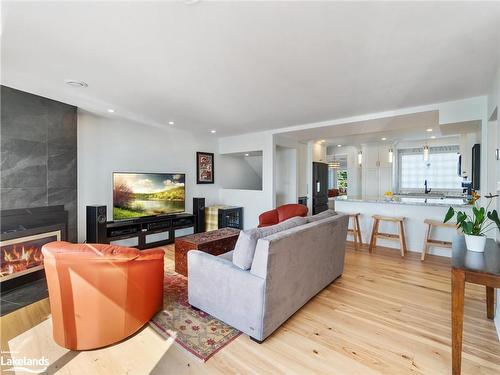 214-603 Atherley Road, Orillia, ON - Indoor Photo Showing Living Room With Fireplace