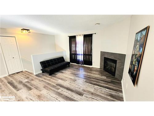 33-200 Pine Street, Bracebridge, ON - Indoor Photo Showing Other Room With Fireplace