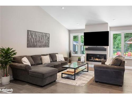 18 Macarthur Drive, Bracebridge, ON - Indoor Photo Showing Living Room With Fireplace