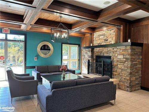 233-190 Jozo Weider Boulevard, The Blue Mountains, ON - Indoor Photo Showing Living Room With Fireplace