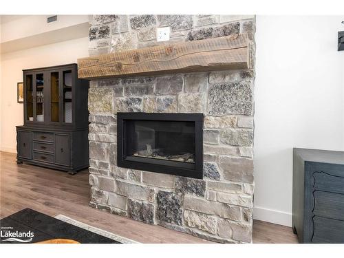 106-10 Beckwith Lane, The Blue Mountains, ON - Indoor Photo Showing Living Room With Fireplace