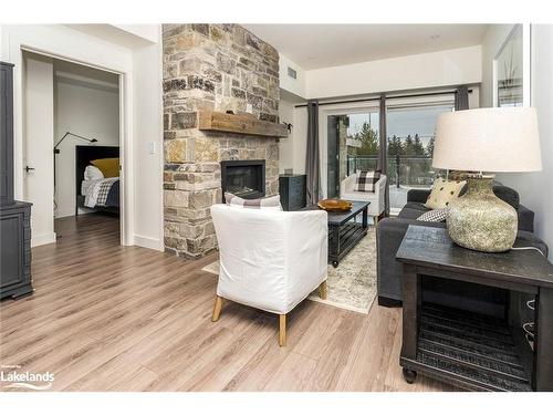 106-10 Beckwith Lane, The Blue Mountains, ON - Indoor Photo Showing Living Room With Fireplace