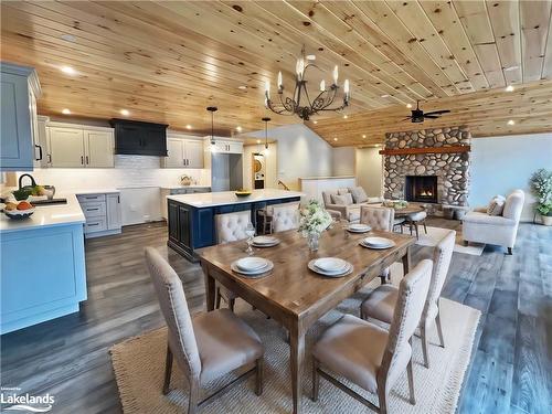 3 Rowntree Lane, Whitestone, ON - Indoor Photo Showing Dining Room With Fireplace