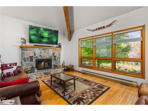 756 Spring Lake Road, South River, ON - Indoor Photo Showing Living Room With Fireplace