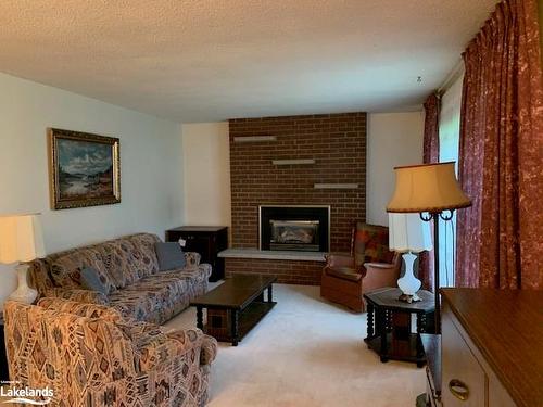 245 Lakewood Park Road, Huntsville, ON - Indoor Photo Showing Living Room With Fireplace