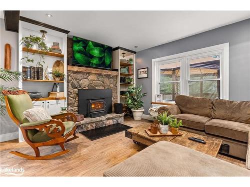 204 Bowyer Road, Huntsville, ON - Indoor Photo Showing Living Room With Fireplace