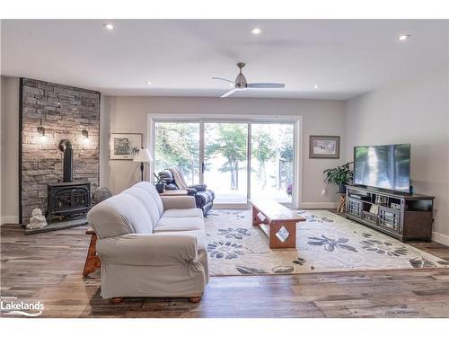 1111 Merrick Drive, Bracebridge, ON - Indoor Photo Showing Living Room With Fireplace