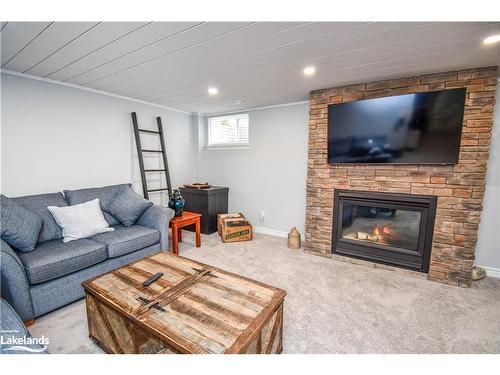 14-90 Burke Street, Penetanguishene, ON - Indoor Photo Showing Living Room With Fireplace