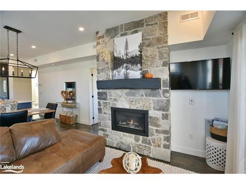 207-12 Beausoleil Lane, The Blue Mountains, ON - Indoor Photo Showing Living Room With Fireplace