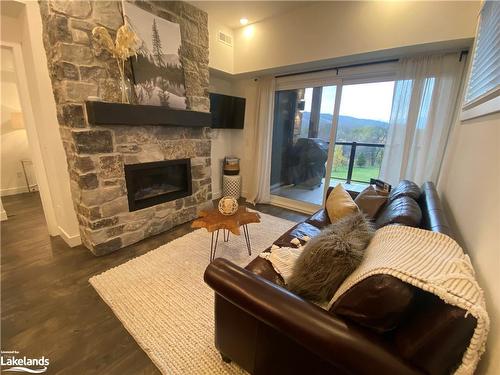 207-12 Beausoleil Lane, The Blue Mountains, ON - Indoor Photo Showing Living Room With Fireplace