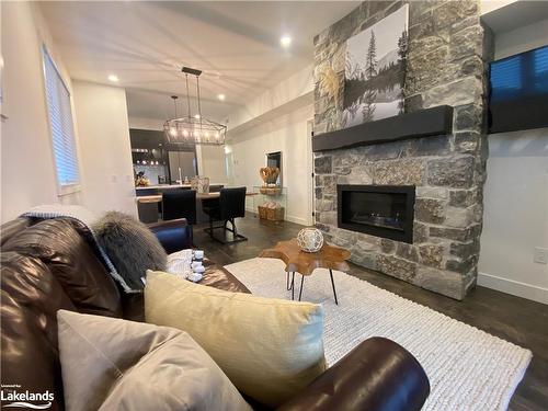 207-12 Beausoleil Lane, The Blue Mountains, ON - Indoor Photo Showing Living Room With Fireplace