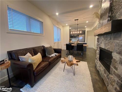 207-12 Beausoleil Lane, The Blue Mountains, ON - Indoor Photo Showing Living Room With Fireplace