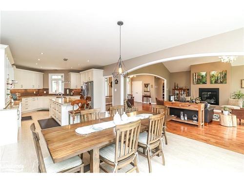 6169 27/28 Nottawasaga Side Road, Stayner, ON - Indoor Photo Showing Dining Room With Fireplace