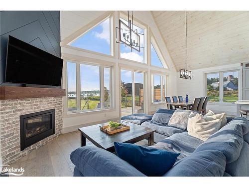 1038 Boyes Bridge Lane, Gravenhurst, ON - Indoor Photo Showing Living Room With Fireplace