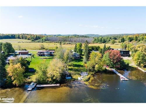 1111 Maplehurst Drive, Huntsville, ON - Outdoor With Body Of Water With View