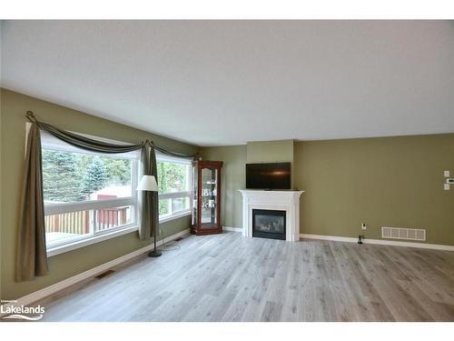 28 Cherry Sands Crescent, Wasaga Beach, ON - Indoor Photo Showing Living Room With Fireplace