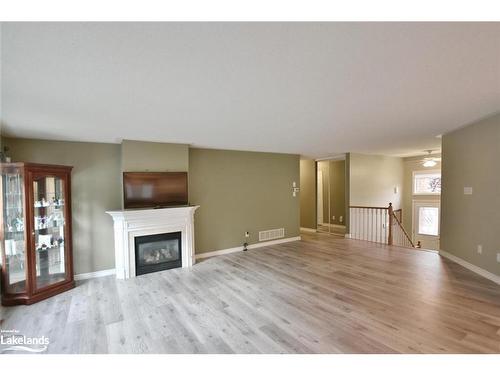 28 Cherry Sands Crescent, Wasaga Beach, ON - Indoor Photo Showing Living Room With Fireplace