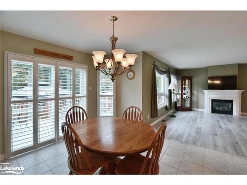 28 Cherry Sands Crescent, Wasaga Beach, ON - Indoor Photo Showing Dining Room With Fireplace