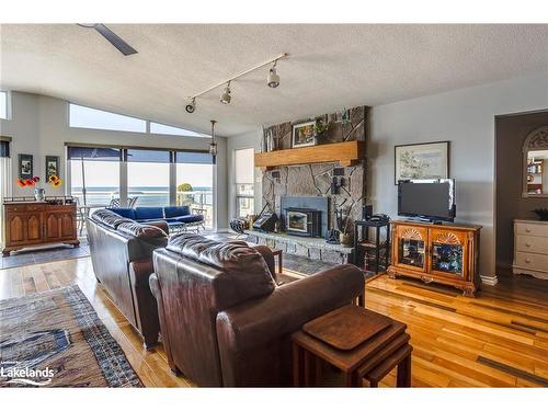 874 Tiny Beaches Road S, Tiny, ON - Indoor Photo Showing Living Room With Fireplace