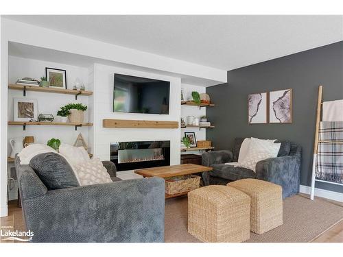 96 Fieldstream Chase Chase, Bracebridge, ON - Indoor Photo Showing Living Room With Fireplace