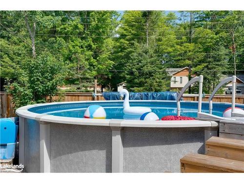 96 Fieldstream Chase Chase, Bracebridge, ON - Outdoor With Above Ground Pool With Backyard