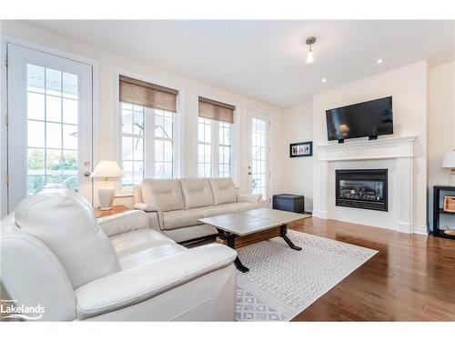 145 Wycliffe Cove, Victoria Harbour, ON - Indoor Photo Showing Living Room With Fireplace