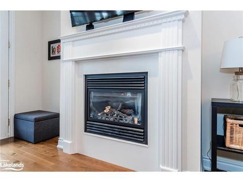 145 Wycliffe Cove, Victoria Harbour, ON - Indoor Photo Showing Living Room With Fireplace