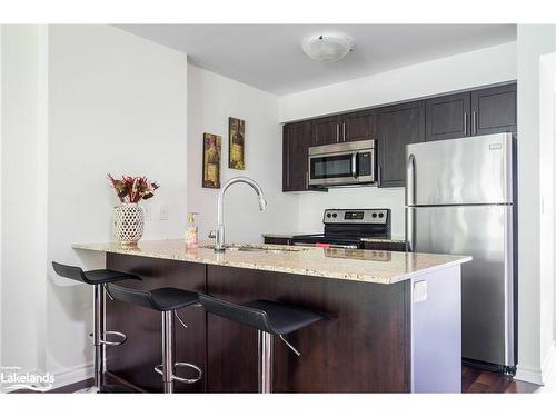 202-4 Brandy Lane Drive, Collingwood, ON - Indoor Photo Showing Kitchen With Stainless Steel Kitchen With Upgraded Kitchen