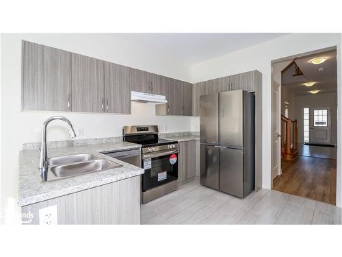 243 Mckenzie Drive, Stayner, ON - Indoor Photo Showing Kitchen With Double Sink