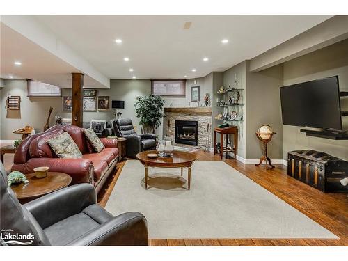 65 Mourning Dove Trail, Tiny, ON - Indoor Photo Showing Living Room With Fireplace