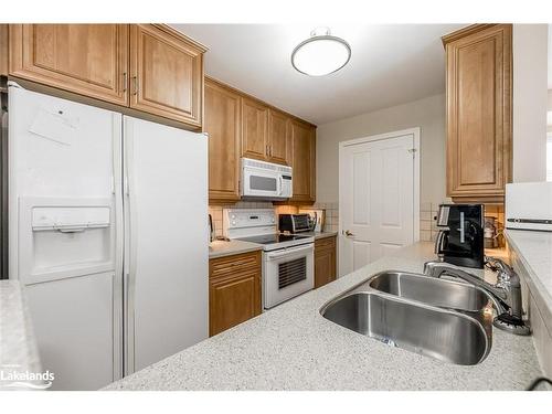 13-656 Johnston Park Avenue, Collingwood, ON - Indoor Photo Showing Kitchen With Double Sink