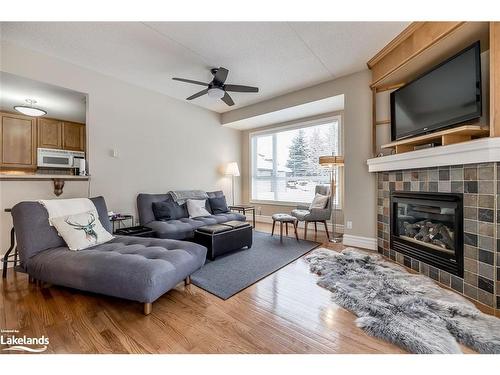 13-656 Johnston Park Avenue, Collingwood, ON - Indoor Photo Showing Living Room With Fireplace