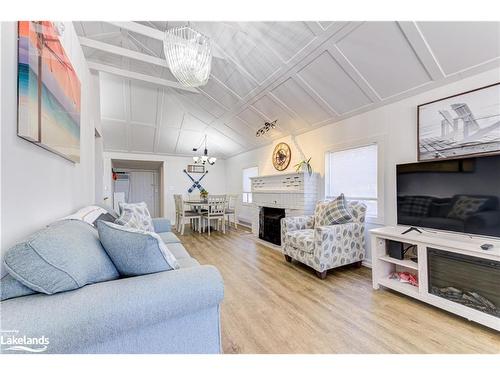 278 Coastline Drive, Wasaga Beach, ON - Indoor Photo Showing Living Room With Fireplace