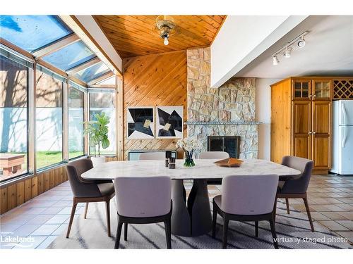 156 Santos Lane, Wasaga Beach, ON - Indoor Photo Showing Dining Room With Fireplace