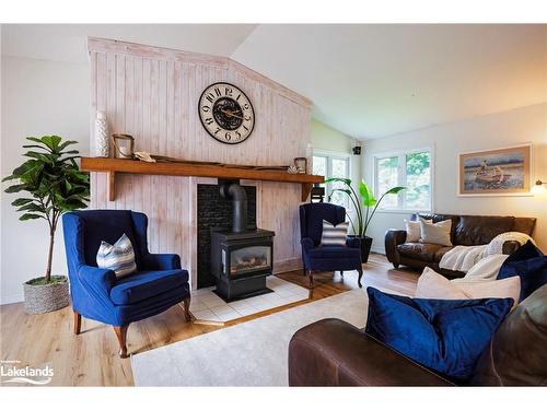 506097 Highway 89, Mulmur, ON - Indoor Photo Showing Living Room With Fireplace