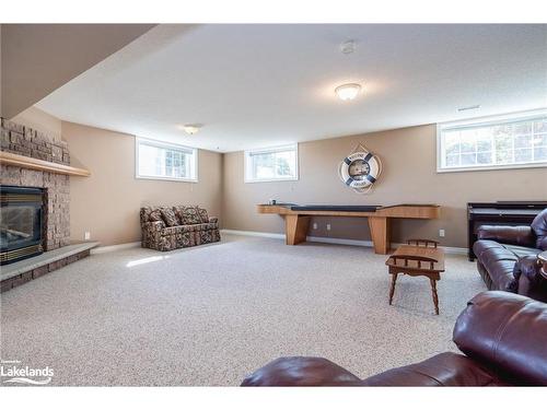 8485 Highway 93, Tiny, ON - Indoor With Fireplace